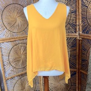 Size M asymmetrical mustard  v necked, lined, sleeveless Cremieux top